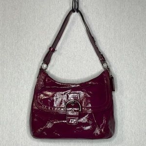 Coach, shoulder or crossbody patent leather bag.